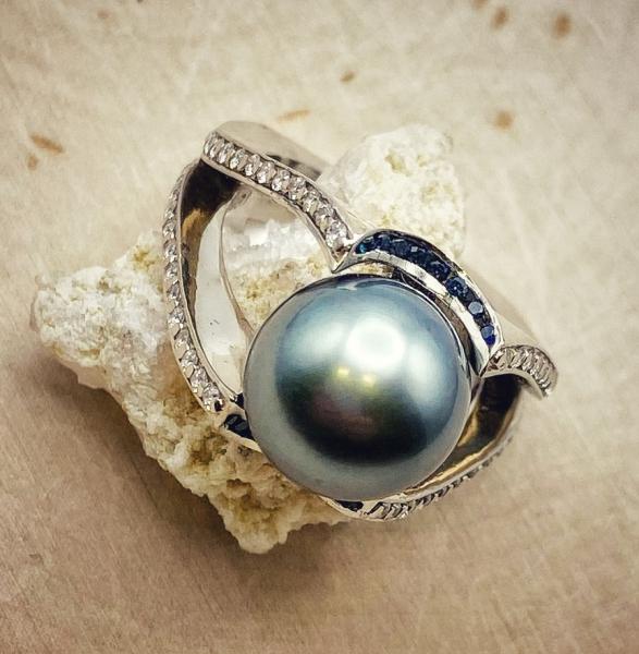 18 karat white gold Tahitian cultured pearl, diamond and blue sapphire ring. $3,950.00