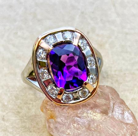 18 karat white and rose gold cushion amethyst and diamond ring. $1850.00 **Sold** May be special ordered.