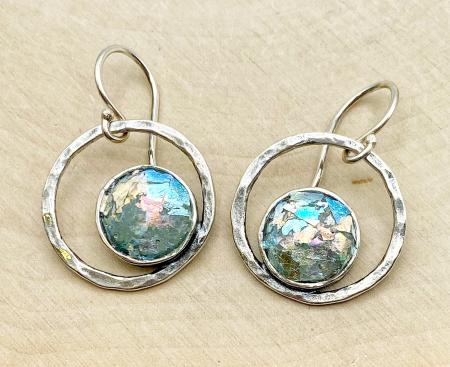 Sterling silver off-center round Roman glass earrings. $315.00