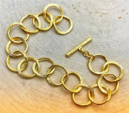 Sterling silver and 18 karat yellow gold vermeil "Florence" bracelet. $480.00