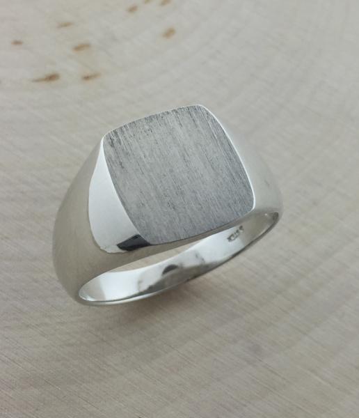 sterling silver signet ring, may be special ordered in 14 or 18 karat gold. Silver price $100.00