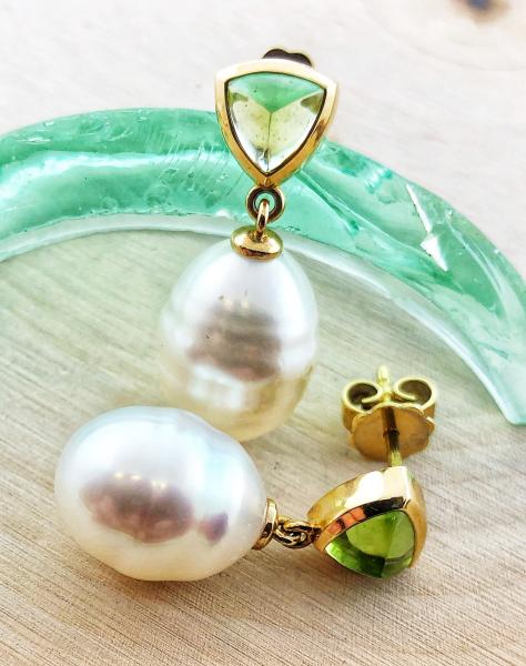 South Sea cultured circle pearl and cabochon peridot earrings in 14 karat yellow gold. *Sold, please inquire about special ordering*