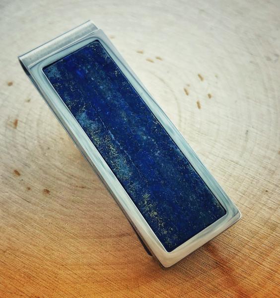 Stainless steel money clip with blue lapis inlay. $ 120.00