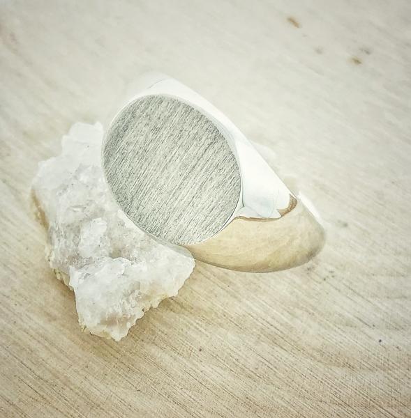Sterling silver oval top signet ring. $65.00