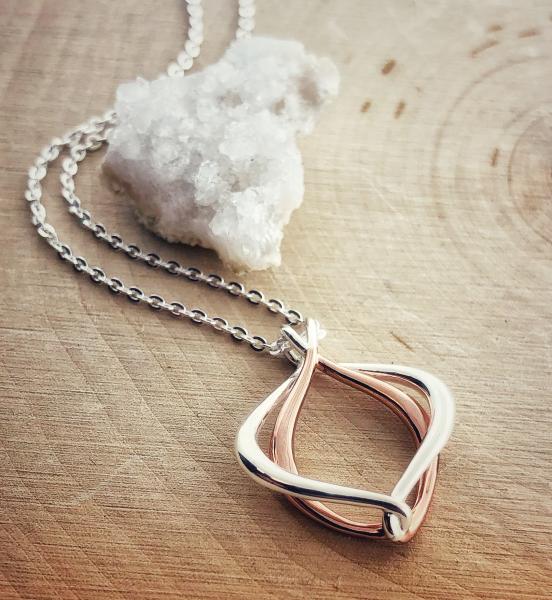 Sterling silver and rose gold vermeil entwined necklace.  $210.00