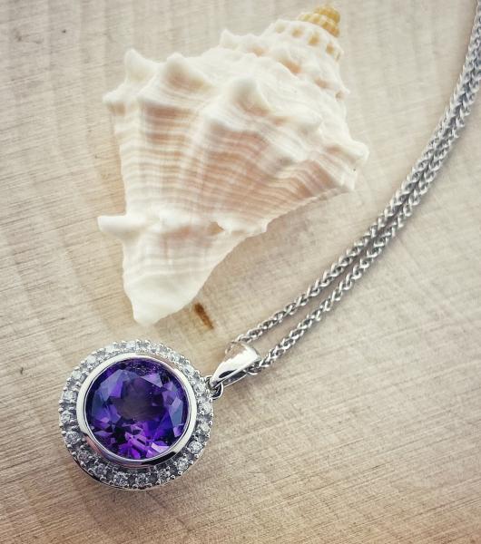 14 karat white gold amethyst and diamond halo necklace. *sold*
