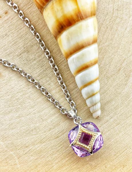 Sterling silver and 18 karat gold necklace with a custom faceted amethyst. *sold*