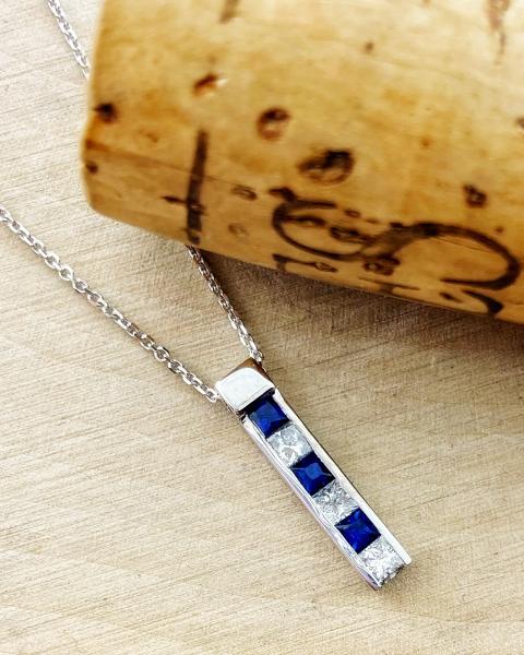 14 karat white gold sapphire and diamond bar necklace. $1300.00 *This item is sold and may be special ordered*