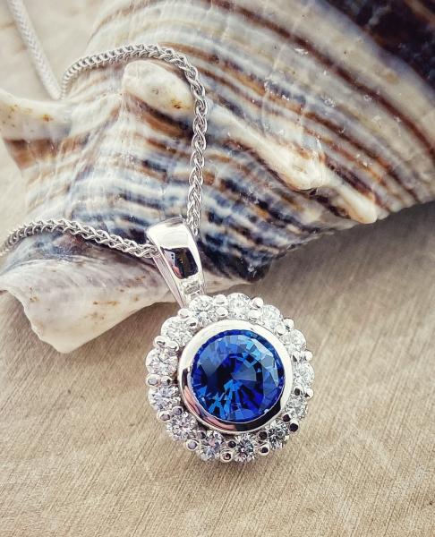 14 karat white gold lab grown blue sapphire and diamond necklace. *sold*