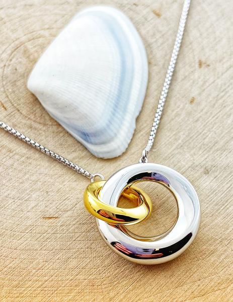 Sterling silver and 18 karat golf vermeil interlocking circles necklace.  $235.00