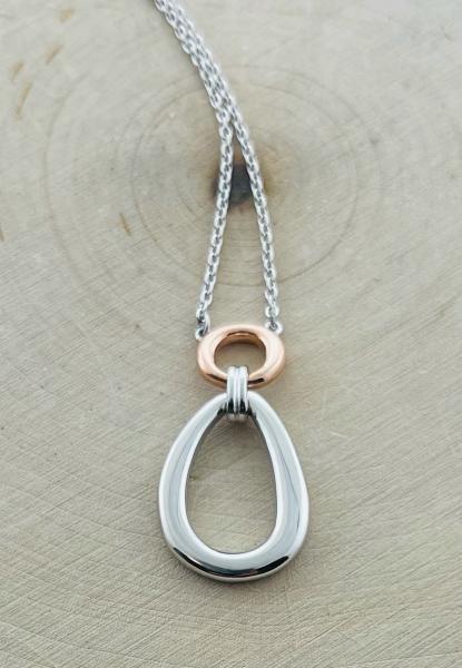 Sterling silver, rose gold vermeil  circle with oval dangle with 16 + 2" chain. $169.00