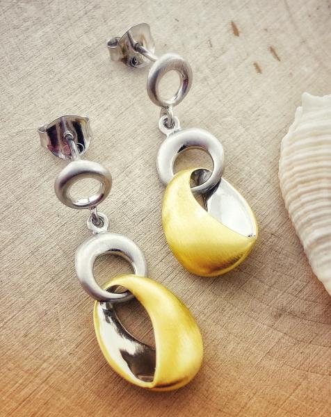 Sterling silver and 18 karat yellow gold vermeil matte finish earrings. $255.00