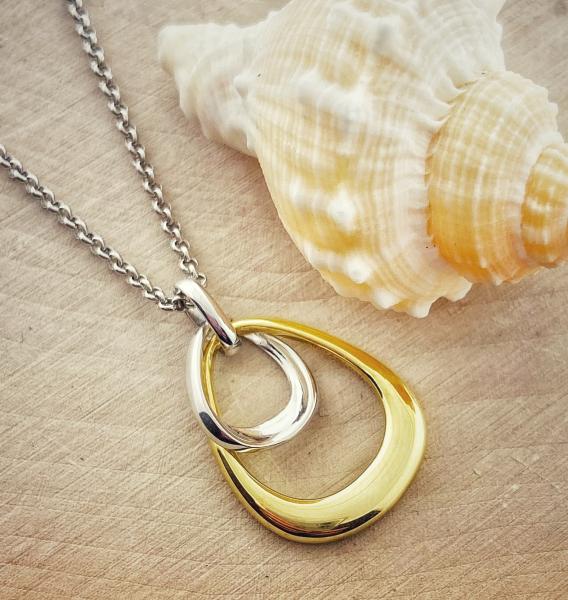 Sterling Silver Yellow Gold Vermeil Bell pendant on chain. $140.00