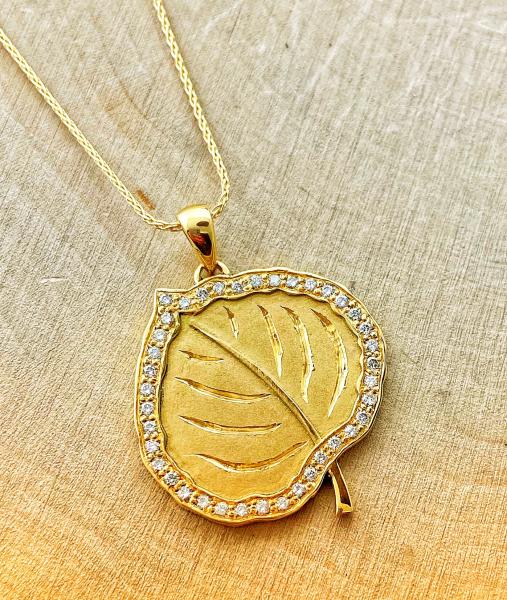 14 karat yellow gold Aspen leaf with 39 brilliant cut diamonds. $1600.00
**2 week delivery**