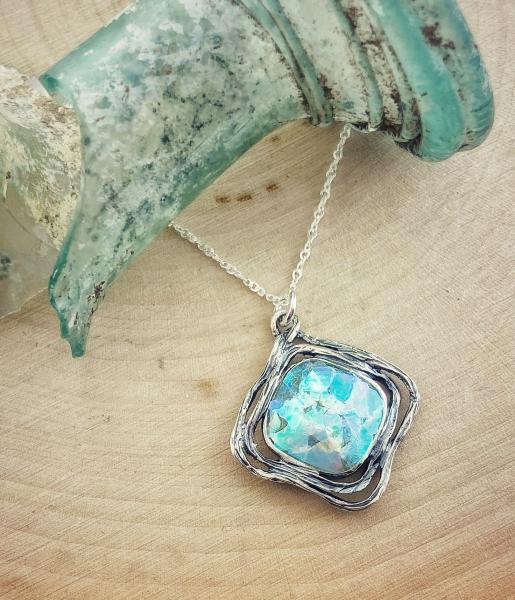 Sterling silver roman glass cushion pendant on chain.   *Currently out of stock*