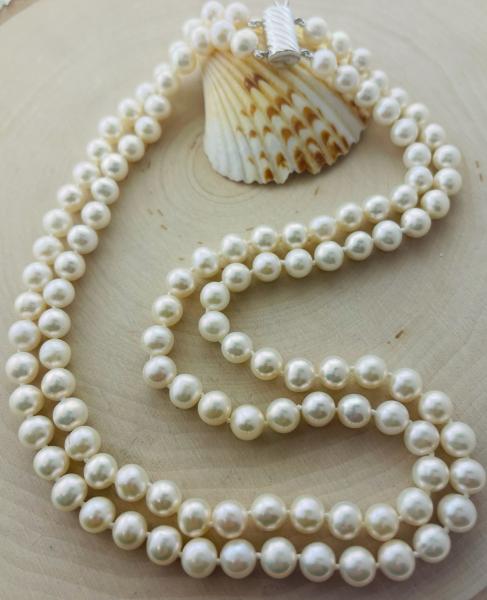 17-18" double fresh water pearl strand 7.5-8mm sterling silver clasp. $350.00
