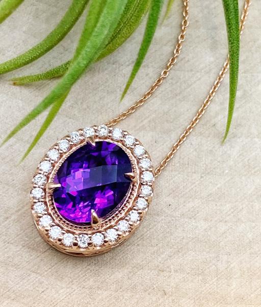 14 karat rose gold checkerboard amethyst and diamond halo necklace. $1475.00