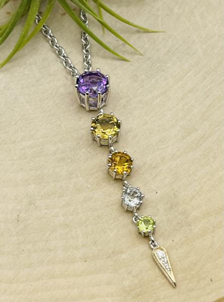 Sterling silver, 18K yellow gold, multi gemstone, diamond drop pendant on chain.