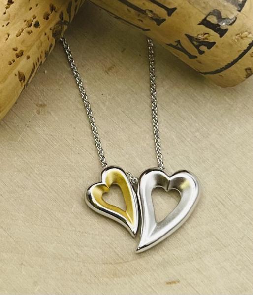 Sterling silver yellow gold vermeil brushed  tender hearts necklace. $215.00