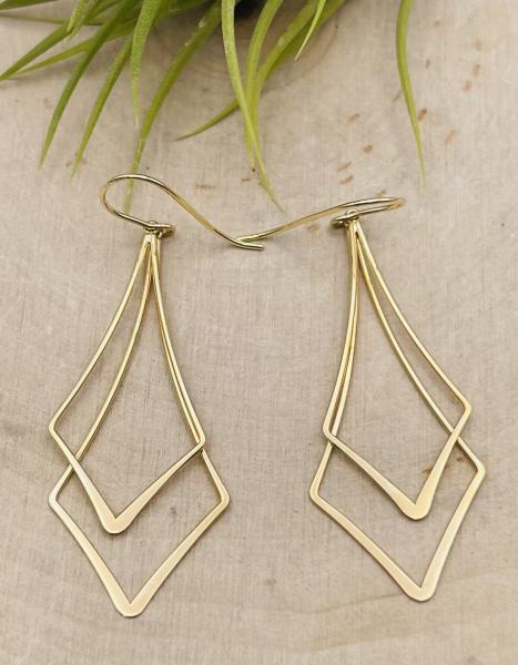14 karat yellow gold kite shape double dangle earrings. $375.00