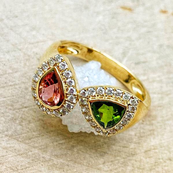 14 karat yellow gold pear shape pink tourmaline, trillion green tourmaline and .30ctw diamond accented ring. $2350.00 *This item is sold and may be special ordered*