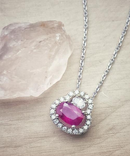 14 karat white gold ruby and diamond necklace. $1908.00