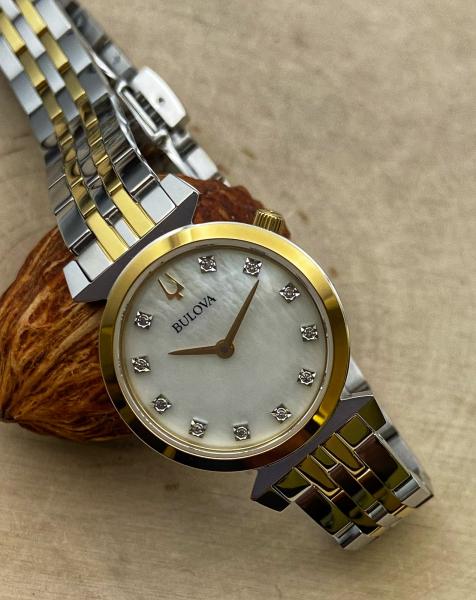 Two tone stainless steel mother of pearl ladies Bulova Regatta watch. $495.00