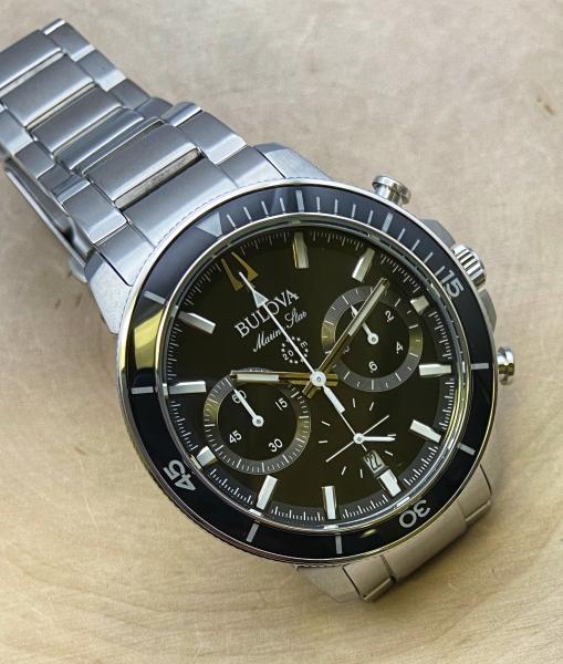 Stainless steel black dial and face gent's Bulova Marine Star watch. $550.00
