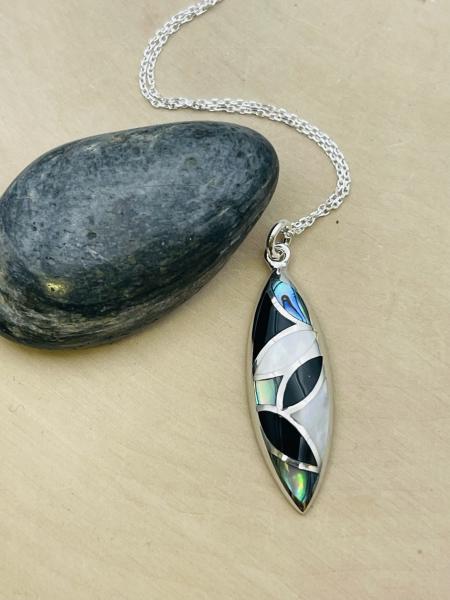 Sterling silver marquise inlay mother of pearl, abalone, onyx drop pendant on chain. $136.00
