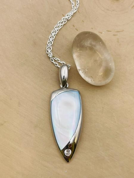 Sterling silver blue mother of pearl shield shape pendant with accent CZ on chain $215.00