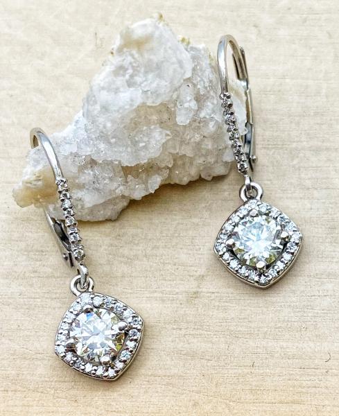 14 karat white gold halo diamond dangle earrings. 58 lab grown diamonds totaling 1.33 carat. $2750.00