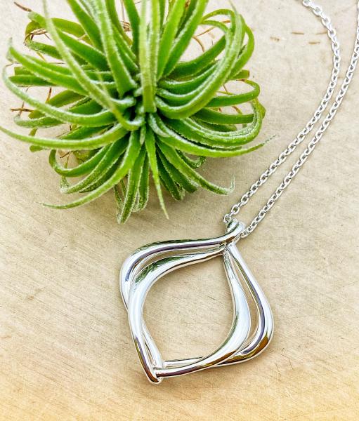 Sterling silver entwined necklace. $185.00