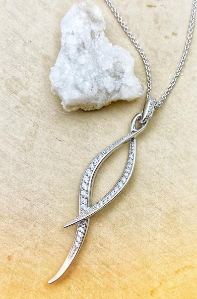 Sterling silver and cubic zirconia  twist pendant. $165.00