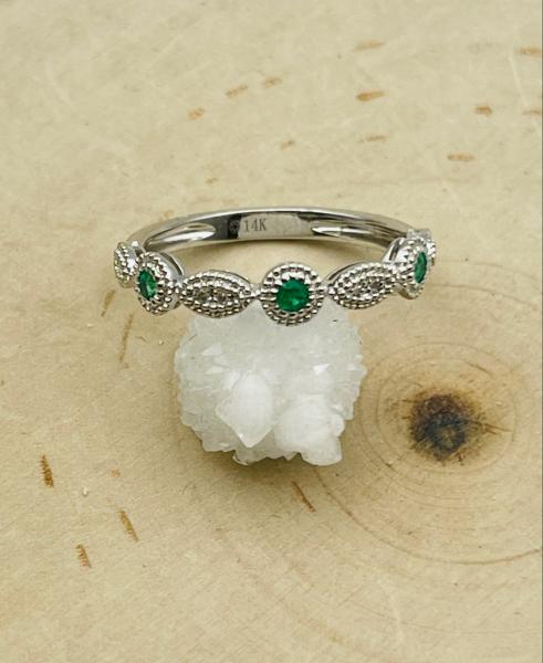 14 karat white gold emerald and diamond ring. $665.00