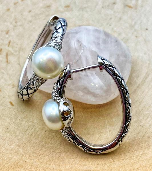 Sterling silver freshwater pearl and diamond hoop earrings. $275.00