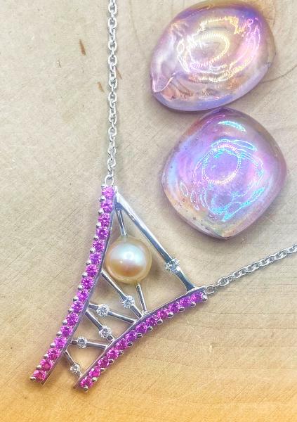 Sterling silver necklace with a pink freshwater pearl, pink sapphires and diamonds. $1450.00 This item is sold and may be special ordered*