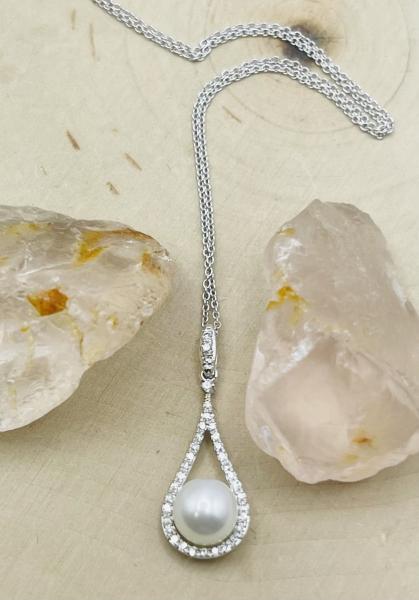 14 karat white gold fresh water pearl and diamond pendant on chain. $690.00
