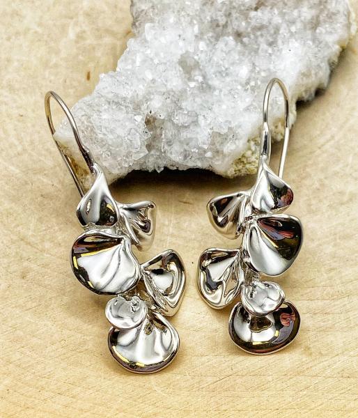 Sterling silver petal earrings. $357.00