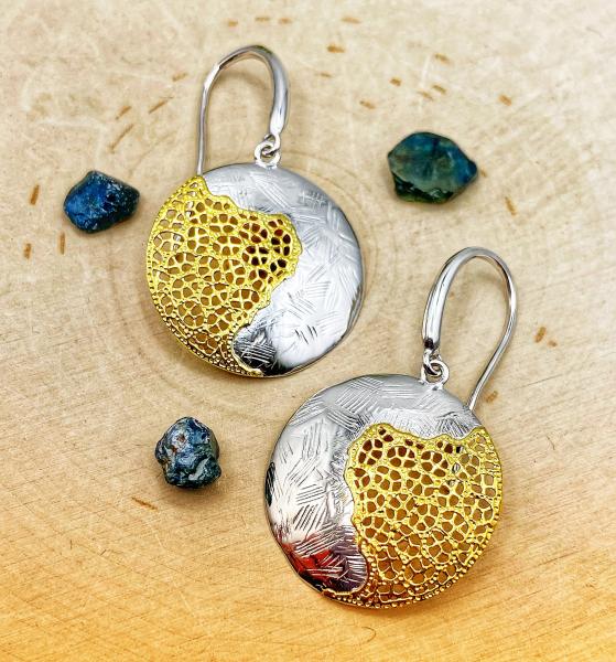 Sterling silver and 18 karat yellow gold vermeil domed earrings. $189.00