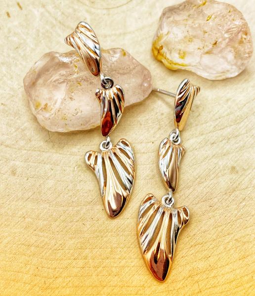 Sterling silver and 18 karat rose gold vermeil wing earrings. $228.00