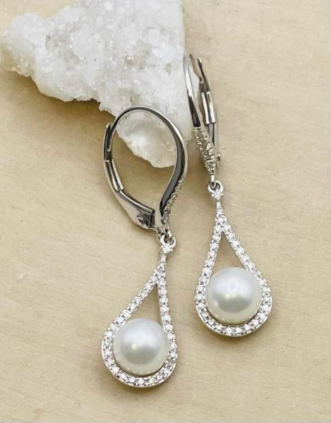 14 karat white gold pearl .17ctw diamond drop dangle earrings. $950.00