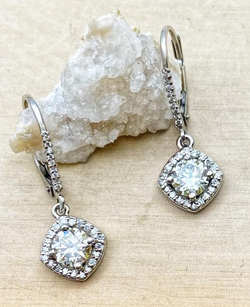 14 karat white gold halo diamond dangle earrings. 58 lab grown diamonds totaling 1.33 carat. $2750.00- 