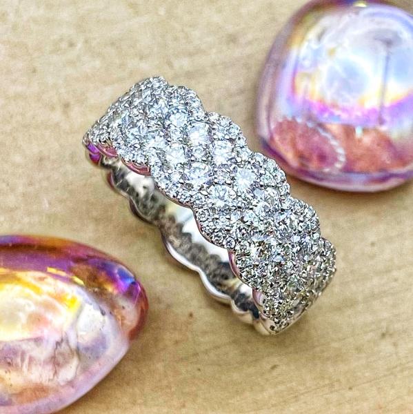 14 karat white gold diamond band totaling 1.64 carats in lab grown brilliant cut diamonds. $4650.00