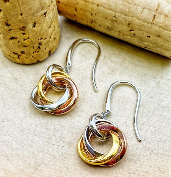 Sterling silver yellow & rose trilogy golds drop earrings. $255.00