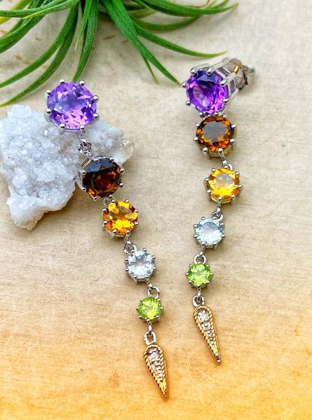 Sterling silver and 18 karat gold amethyst, smokey quartz, citrine, blue topaz and peridot earrings. $500.00