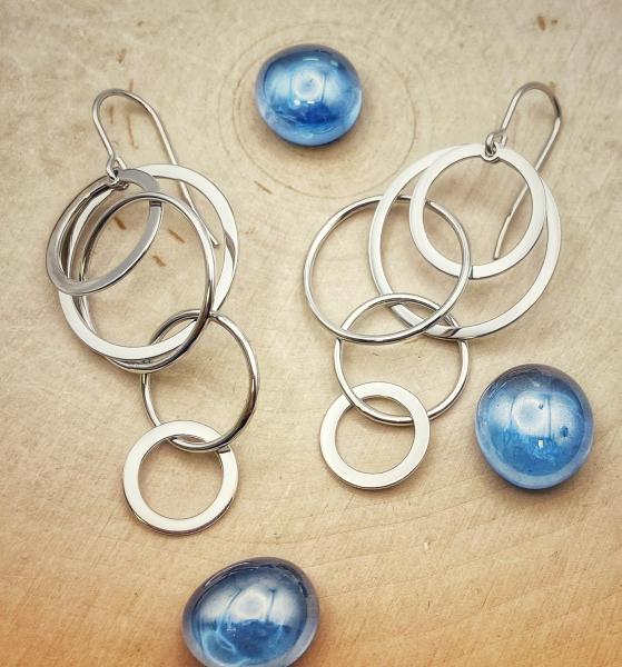Sterling silver cascading circles drop earrings. $145.00