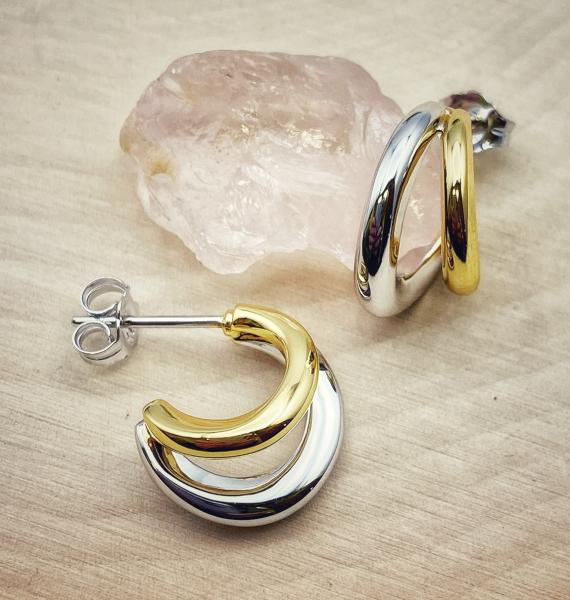 Sterling silver and 18 karat gold vermeil hoops. $160.00