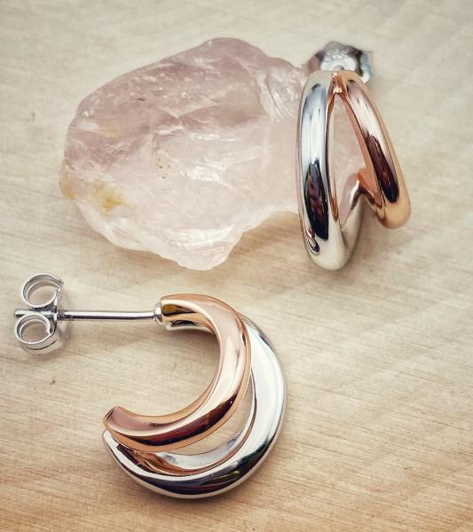 Sterling silver and 18 karat rose gold vermeil hoop earrings. $165.00