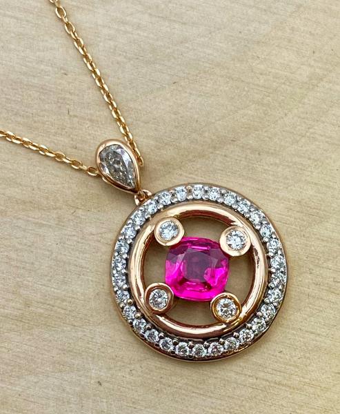 18 karat rose gold necklace with a  0.98 carat cushion cut ruby, 34 brilliant cut diamonds and one pear shape brilliant cut diamond. $5,500.00 ***SOLD***