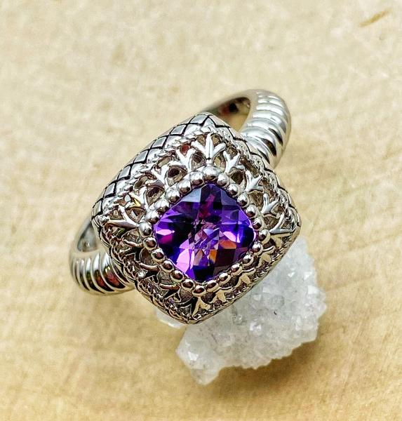 Sterling silver checkerboard cut amethyst ring. $150.00